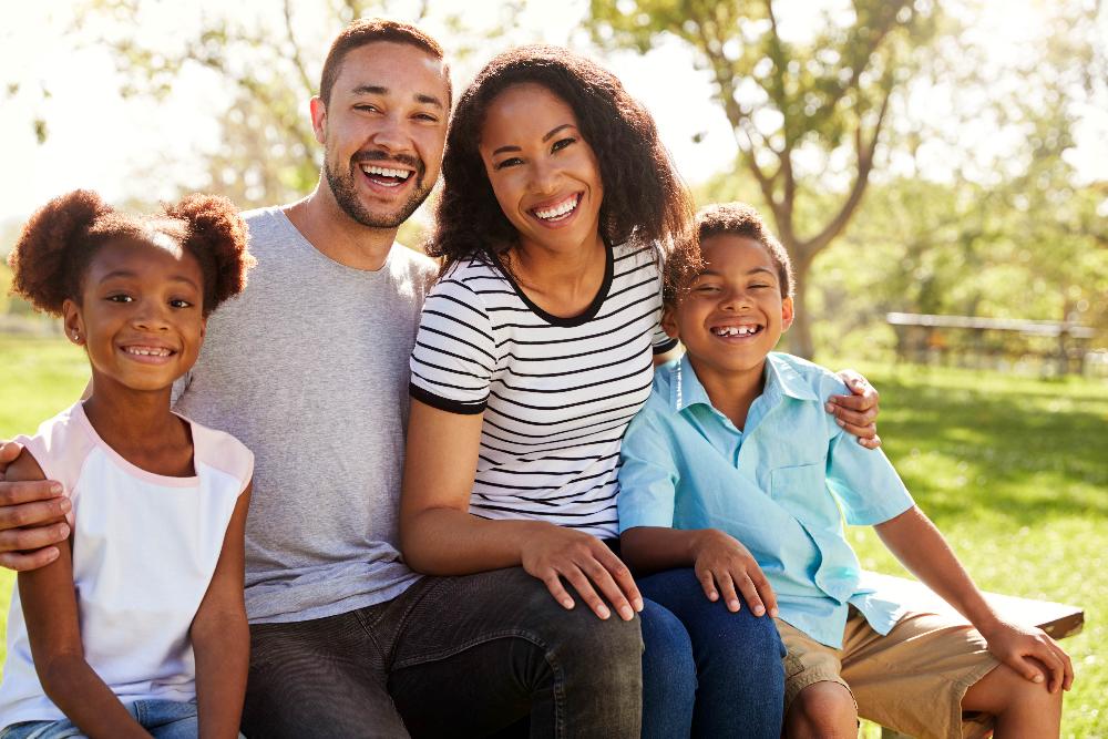 A happy family after dental check up in Alpharetta Creek Restorative Dentistry