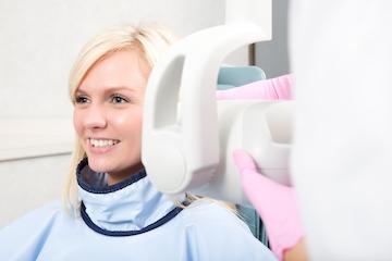 woman getting digital dental xray