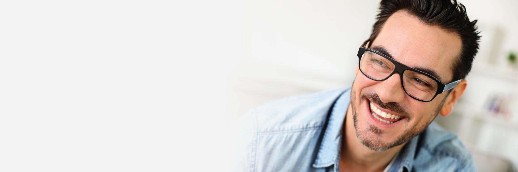 man smiling after getting cosmetic dentistry in Alpharetta