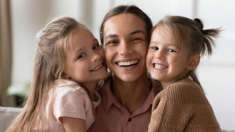 A happy family after dental check up in Alpharetta Creek Restorative Dentistry