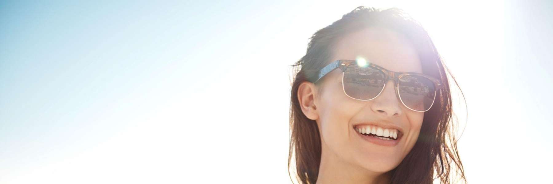 A picture of a lady smiling after cosmetic dentistry in Alpharetta Creek Restorative Dentistry